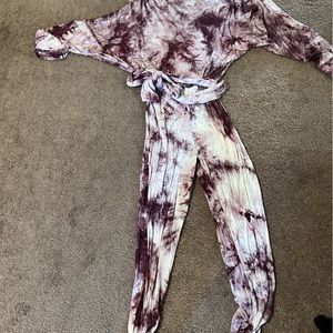 Tie Dye off shoulder romper with belt.